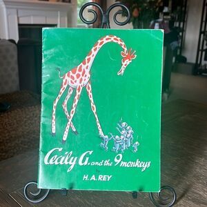 The 1st Book about Curious George: Cecily G & the 9 Monkeys